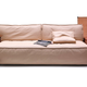 Illustration for article titled You Could Probably Spend Your Entire Life On Starcks New Gadget-Friendly Sofa